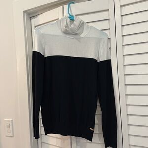 Black and white Calvin Klein turtleneck